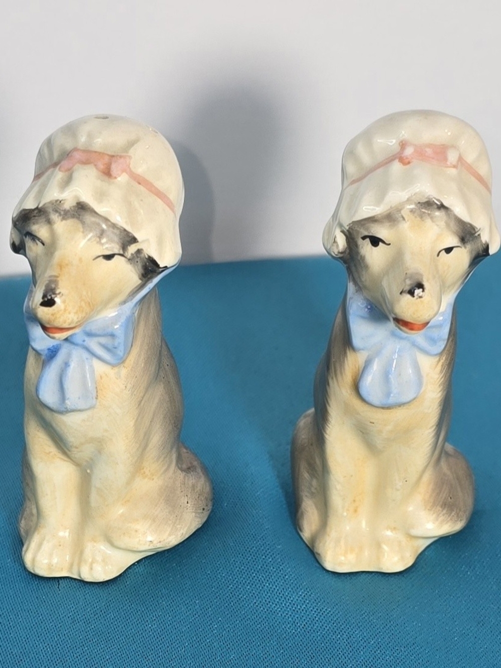 Ceramic Dog Figurine Pair in Cream with Blue Bows